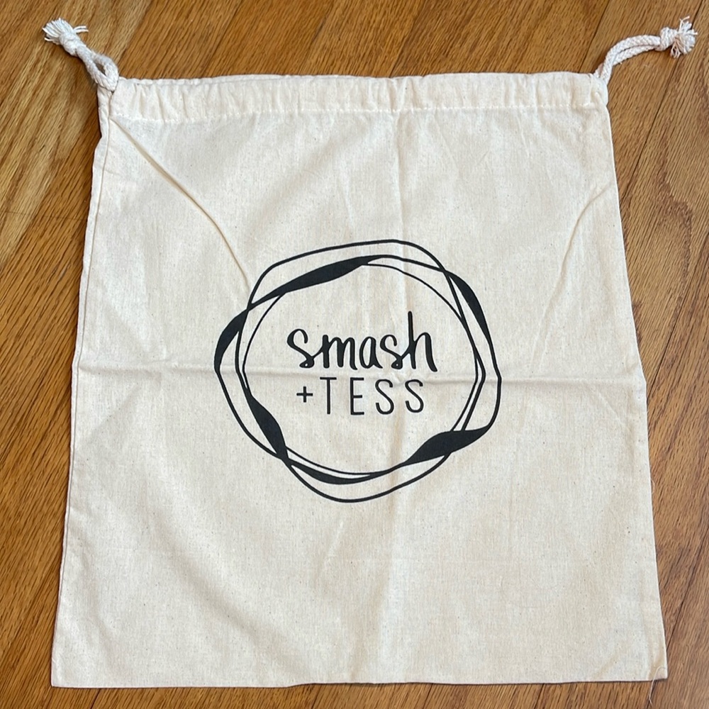 Smash + Tess dust bag. 13.5”x15”. Brand new. Cream with black writing.